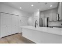Open kitchen with a large island and stainless steel appliances at 1409 Carlyle Park Cir, Highlands Ranch, CO 80129