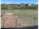 Expansive vacant lot awaiting your dream home, with neighborhood views and endless possibilities to build your perfect oasis at 14583 Hudson Way, Thornton, CO 80602