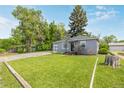 Charming single Gathering home featuring a well-manicured lawn and delightful curb appeal at 8450 W 13Th St, Lakewood, CO 80215
