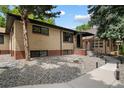 Inviting single-Gathering home with low maintenance, drought-tolerant landscaping, sidewalk and covered porch at 1243 Monroe St, Denver, CO 80206