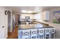 Spacious kitchen featuring stainless steel appliances and an island at 4632 S Ensenada St, Centennial, CO 80015