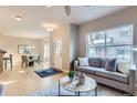 Comfortable living room with natural light, hardwood floors, and neutral décor at 4137 Clifton Ct, Boulder, CO 80301