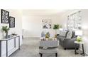 Inviting living room features neutral-toned furniture and stylish decor at 3408 S Kittredge St, Aurora, CO 80013
