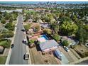 A pleasant residential area with a tidy home and sparkling backyard pool at 2141 W Gill Pl, Denver, CO 80223