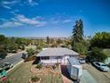 Spacious single-story home with city views from a desirable neighborhood location at 2141 W Gill Pl, Denver, CO 80223
