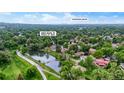 Aerial shot of the property at 6882 Quail St, Arvada, CO, with views of Downtown Denver in the distance at 6882 Quail St, Arvada, CO 80004