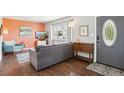 Cozy living room featuring hardwood floors, a large window, and stylish decor at 320 Orion St, Golden, CO 80401