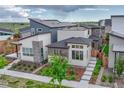 Stylish home exterior showcasing modern design and well-maintained landscaping at 6366 N Emporia St, Denver, CO 80238
