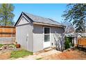 A detached shed in the backyard offers additional storage and utility space at 764 S Osage St, Denver, CO 80223
