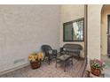 Inviting patio with stylish wicker furniture and decorative potted plants at 4929 W 73Rd Ave, Westminster, CO 80030