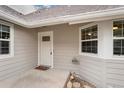 Inviting front entrance with a charming welcome mat and stylish details at 8040 S Culebra Peak, Littleton, CO 80127