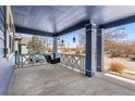 Relaxing porch with a swing, offering an inviting outdoor space with great neighborhood views at 1114 Lasnik St, Erie, CO 80516