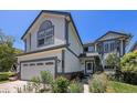 View of a two-story home showcasing its architectural design and inviting entrance at 17045 Hastings Ave, Parker, CO 80134
