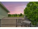 Charming upper deck with seating, perfect for enjoying the beautiful sunset and views at 15545 Lipan St, Broomfield, CO 80023