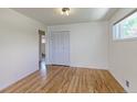 Cozy bedroom features hardwood floors, a closet and neutral paint at 11085 Clarkson St, Northglenn, CO 80233