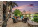 Outdoor living space with fire pit and mountain views, perfect for entertaining at 2349 Hickory Pl, Erie, CO 80516