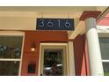 Close-up of the house number '3616' displayed prominently on the front porch at 3616 N Gilpin St, Denver, CO 80205