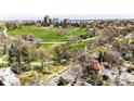 Beautiful aerial shot of a home, park, and city skyline, showcasing an ideal location at 780 N Franklin St, Denver, CO 80218