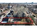 An aerial view of a home showcasing yard dimensions and views of the surrounding neighborhood at 2238 Newton St, Denver, CO 80211