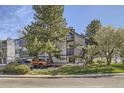 Charming condo featuring multiple balconies, mature trees, and convenient parking at 3363 Oneal Pkwy # 36, Boulder, CO 80301