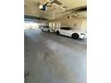 Spacious garage with room for two cars; perfect for car enthusiasts or extra storage at 8659 E Kenyon Ave, Denver, CO 80237