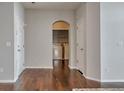 Hallway with access to laundry room with a white washer and dryer at 14251 E 1St Dr # 308, Aurora, CO 80011