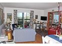 Cozy living room featuring hardwood floors and natural lighting at 13890 E Marina Dr # 605, Aurora, CO 80014