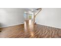 Bright living room with hardwood floors and an open floor plan at 9638 Marion Way, Thornton, CO 80229