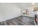 Bright and airy living room with a fireplace and large windows at 897 S Granby Cir, Aurora, CO 80012