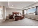 Spacious main bedroom with mountain view and ample natural light at 211 Luna Ct, Erie, CO 80516