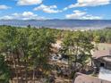 Beautiful aerial view showing the property's secluded location and mountain views at 878 Tree Bark Ter, Colorado Springs, CO 80132