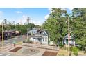 Two-story home on a corner lot near city skyline at 1076 Mariposa St, Denver, CO 80204