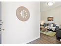 Inviting entryway with wood floors and views into the bright and airy living room at 1076 Mariposa St, Denver, CO 80204