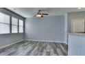 Bright living room with lots of natural light and sleek flooring, perfect for relaxation at 17205 Waterhouse Cir # C, Parker, CO 80134