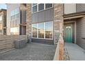 Modern two-story townhome with stone accents at 9445 W 58Th Cir # C, Arvada, CO 80002