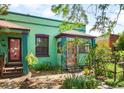 Charming home featuring unique architectural details and colorful, eye-catching trim at 178 W Cedar Ave, Denver, CO 80223