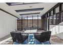 Covered patio with comfortable seating and modern design at 3069 S Detroit Way, Denver, CO 80210