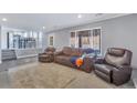 Spacious living room featuring a comfortable seating arrangement at 2221 S Dearborn St, Aurora, CO 80014