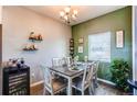 Small dining area with table and chairs at 14700 E 104Th Ave # 3602, Commerce City, CO 80022