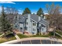Aerial shot of condo complex showcasing well-maintained landscaping and ample parking at 4086 S Carson St # F, Aurora, CO 80014