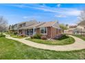 Inviting exterior view of home and walkable community sidewalk at 2757 E Geddes Ave, Centennial, CO 80122
