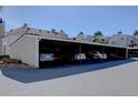 Carport parking offering covered spaces for residents and visitors, with multiple cars parked at 13633 E Yale Ave # B, Aurora, CO 80015