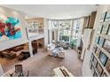 Bright, expansive living room with soaring ceilings, large windows, and sophisticated decor at 2615 Oak Dr # 7, Lakewood, CO 80215