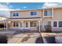 Attractive condo exterior featuring a covered entrance and designated parking at 8975 Field St # 39, Broomfield, CO 80021
