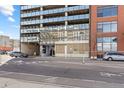 Modern building exterior featuring a unique facade and convenient street parking at 2020 Arapahoe St # 970, Denver, CO 80205