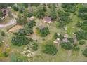 A picturesque aerial view of the entire property, highlighting the serene surroundings at 7390 Rafter Rd, Franktown, CO 80116