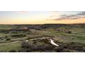 Scenic view of rolling hills and golden sky at sunset at 7611 Copper Sky Ct, Castle Pines, CO 80108