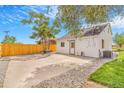 The backyard features a concrete patio, perfect for outdoor dining and entertaining at 3452 S Clay St, Englewood, CO 80110
