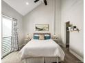 Vaulted main bedroom with a patio provides a light-filled and cozy retreat at 4232 Jason St # 7, Denver, CO 80211