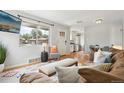 Bright living room with hardwood floors and stylish furnishings at 3285 S Delaware St, Englewood, CO 80110